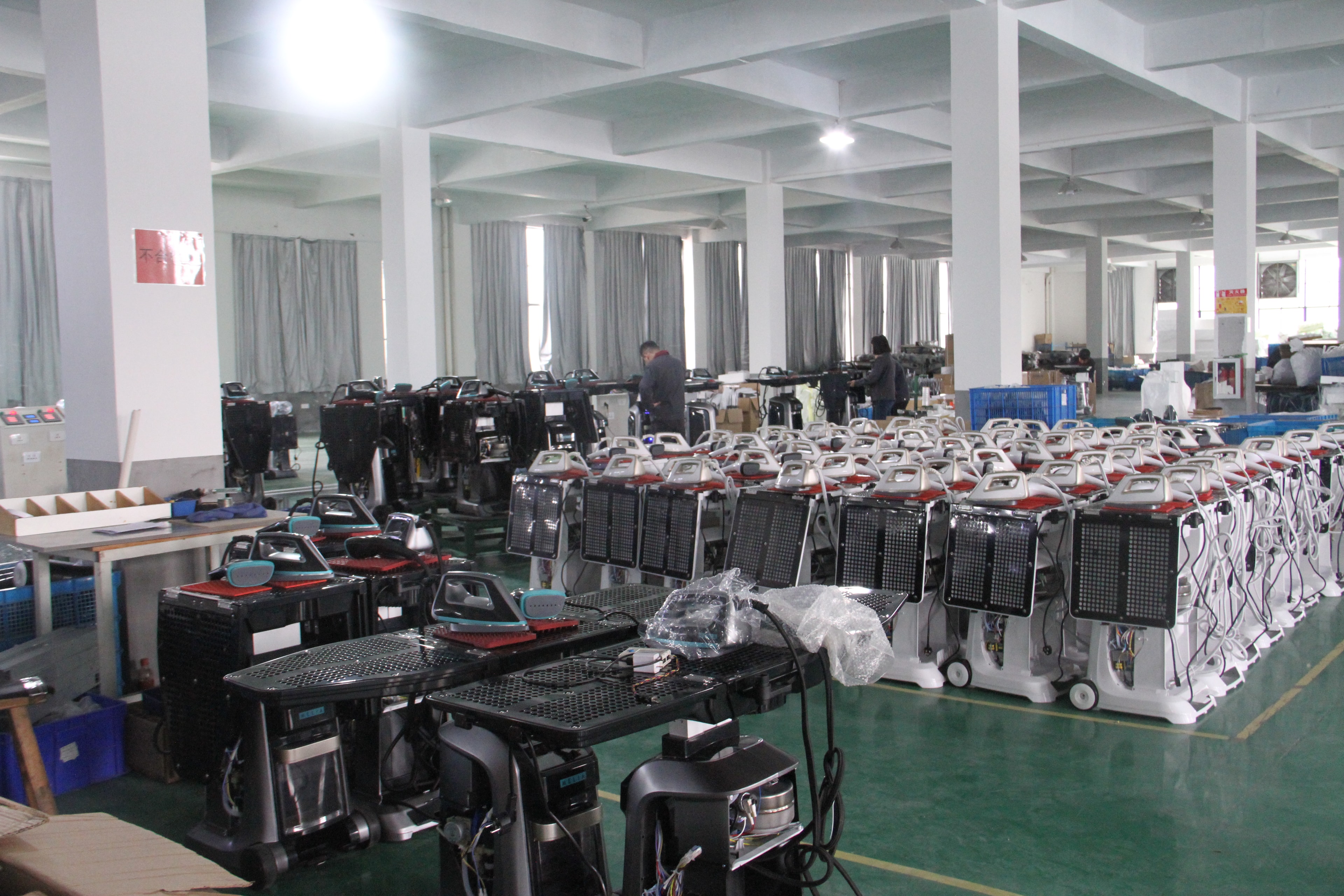 HALEE garment-care appliances arranged in the production workshop